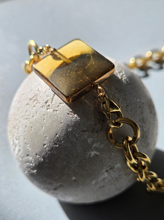 Collier en acier inoxydable avec sa perle charm interchangeable en verre de Bohême